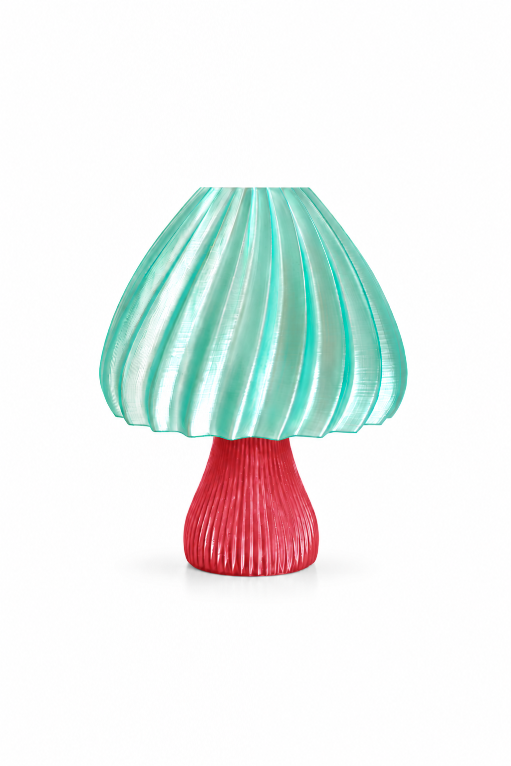A mushroom-shaped table lamp with a ribbed red base and a pleated translucent mint green shade, shown on a plain white background.
